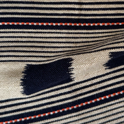 The Lost and Found - Indigo custom fabric features a graphic pattern of geometric shapes and lines, which is ideal for upholstery.