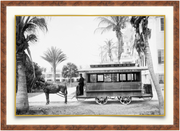 A fine art print from an antique photograph.  An image of a Florida East Coast Trolley on Palm Beach Island.  Available print only or framed.