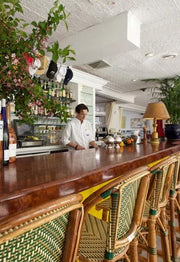 French Bar with authentic hand woven bar stools..
