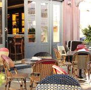 French Outdoor Cafe with authentic hand woven bistro chairs.