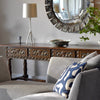 spanish console with mirror and lamp next to sofa