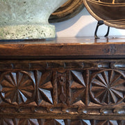 detail of hand carving on spanish console