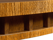 detial of the edge of the landy dining table in honey oak