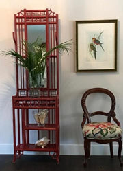 asian inspired hall stand with fine art print and chair and faux palm leaves