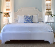 Jackson bed headboard and frame with throw pillows lamps and bedside tables